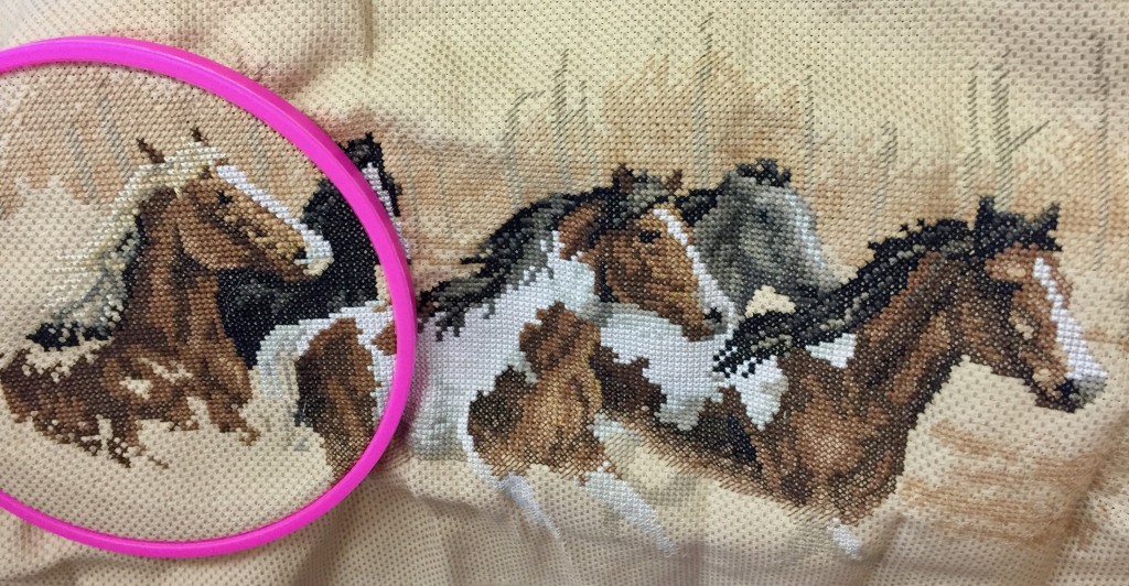 Cross-stitched horses.