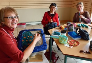 Rachael, Grace and Cathy working away.