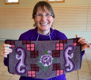 Linda showing off her very first hooked piece! Congrats on such beautiful work!